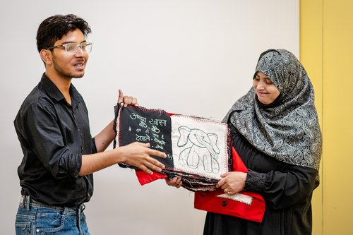 Hariom and Gulafsha at a workshop at KNMA