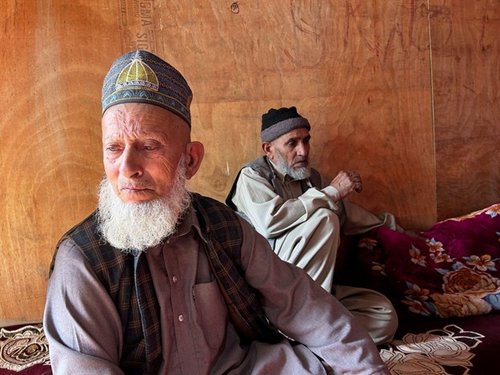 The mortar shells did not discriminate by religion or social status. “We lost our breadwinner,” says Moh’d Sharief, Abrar’s father (seated on the right). Moh’d Abrar leaves behind three children, his parents, brother, and his uncle’s family. “He was a rare soul - always looking after everyone. This cruel war snatched him from us,” says Qamaruddin, his uncle (seated on the left).