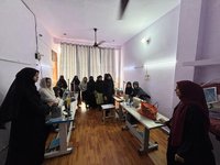 Women participate in Farheen Ansari’s stitching class at Sabaat.