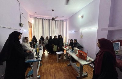 Women participate in Farheen Ansari’s stitching class at Sabaat.